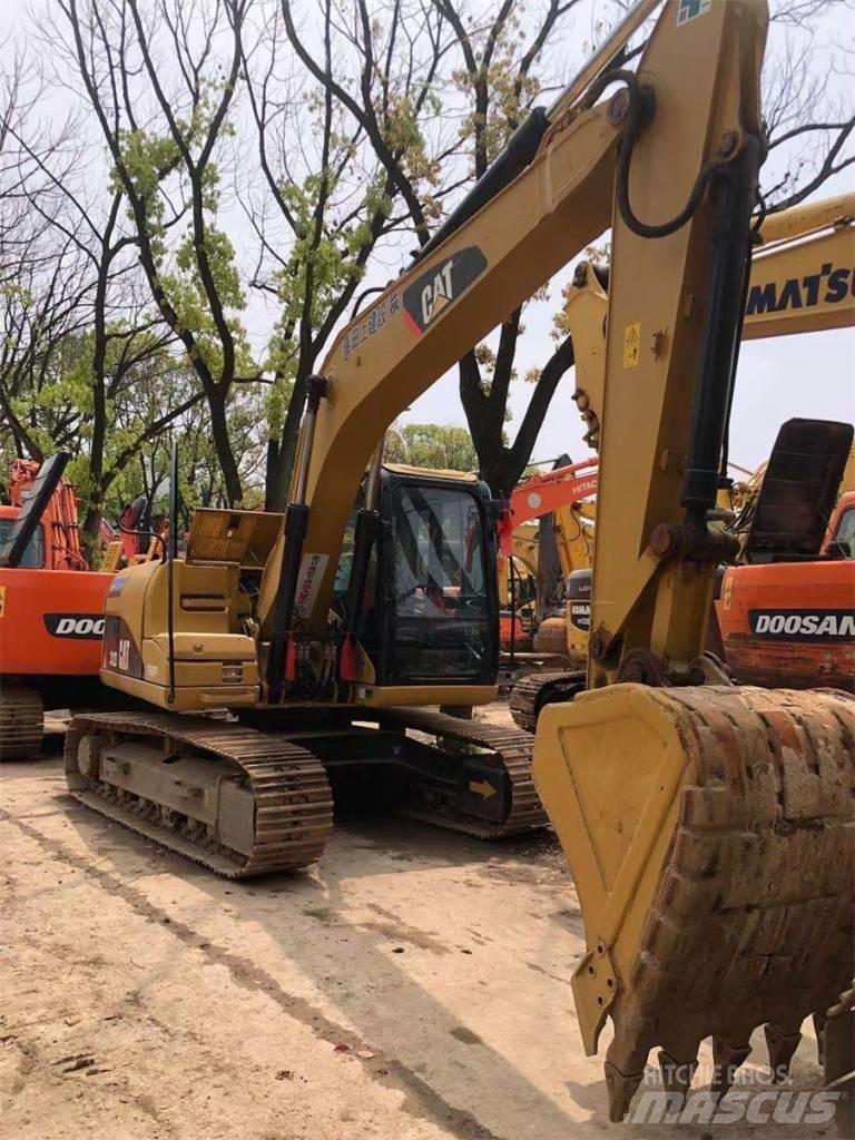CAT 312 D Гусеничні екскаватори