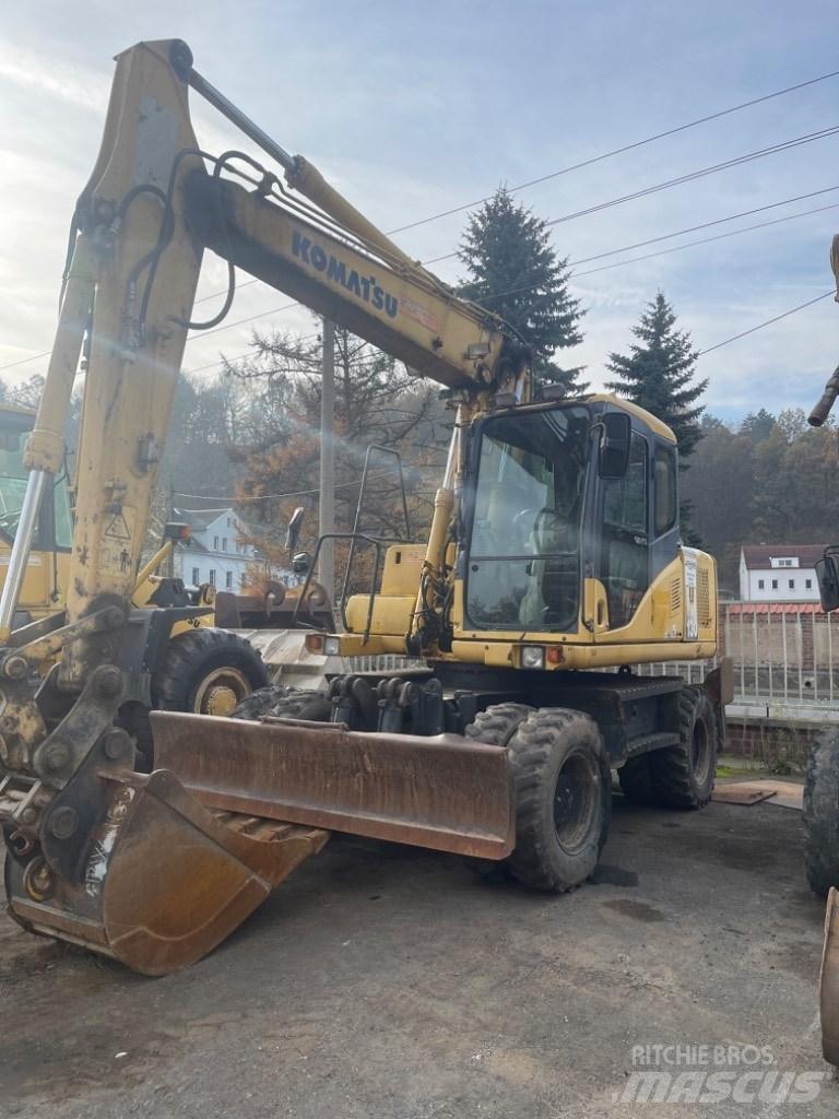 Komatsu PW 130-7K Колісні екскаватори