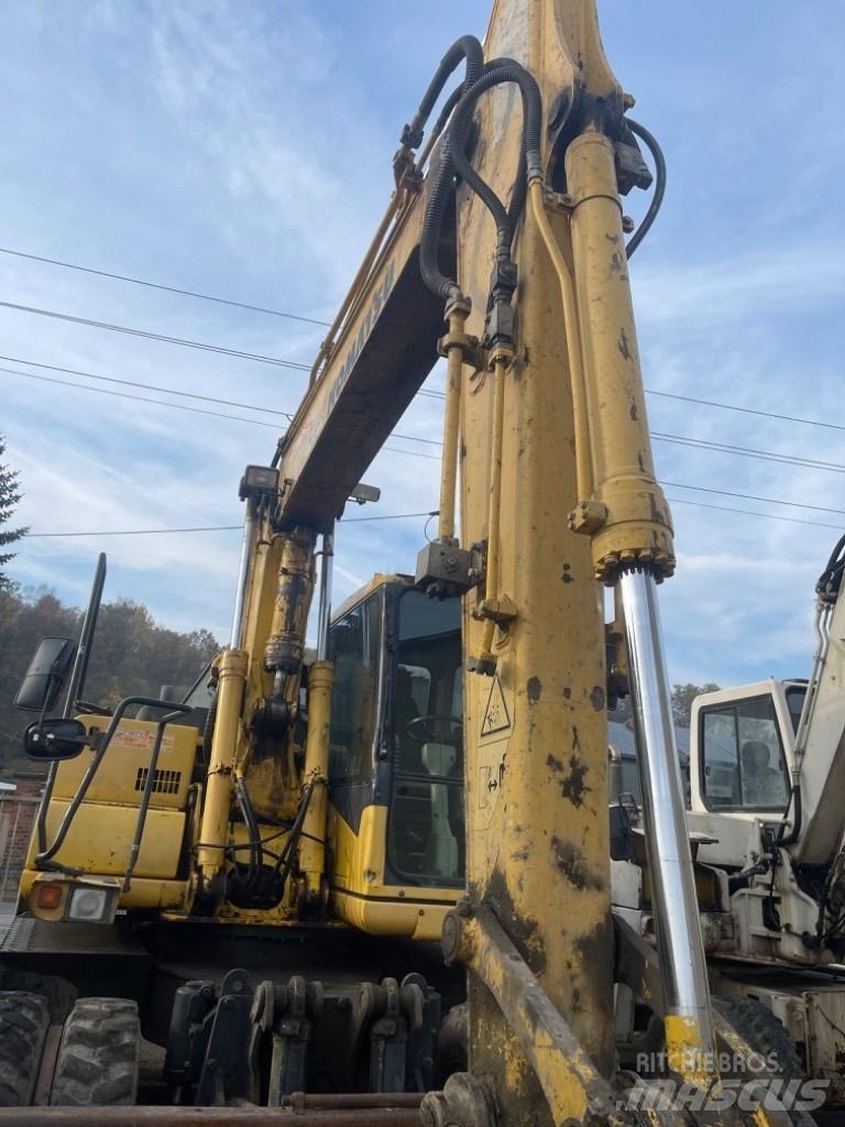 Komatsu PW 130-7K Колісні екскаватори