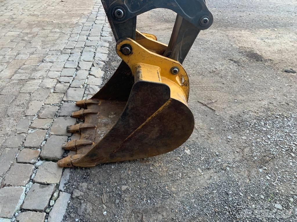 John Deere 310 L Екскаватори-навантажувачі