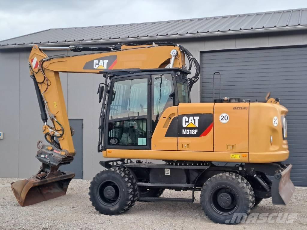 CAT M318F Колісні екскаватори