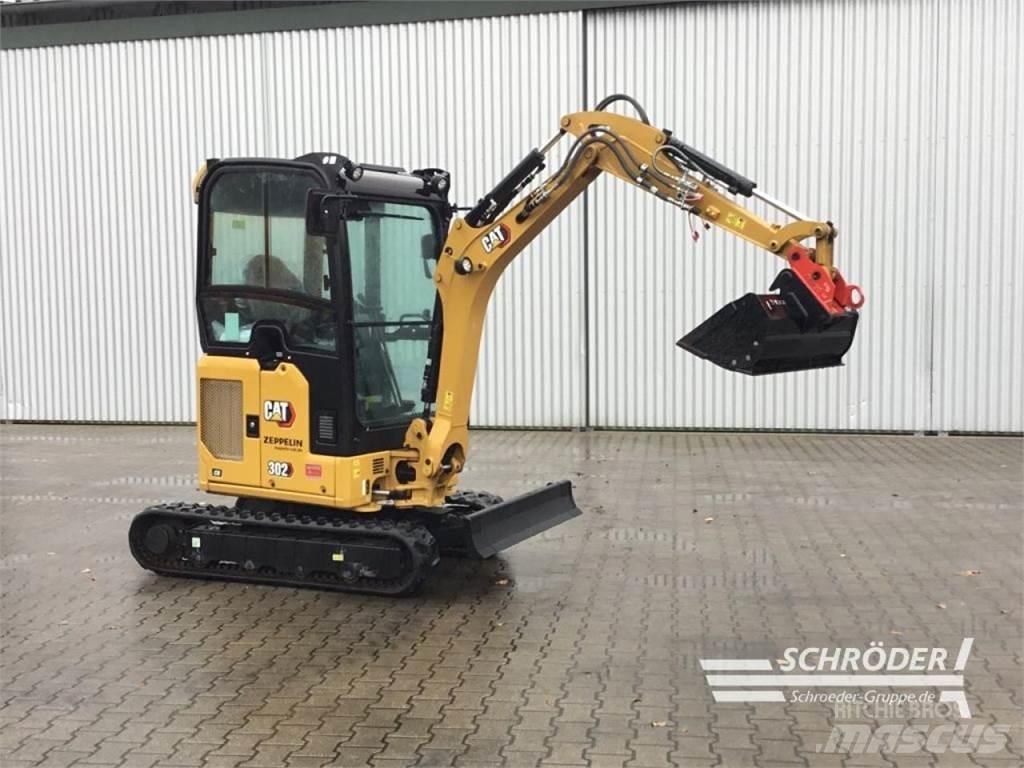 CAT 302 CR Колісні екскаватори