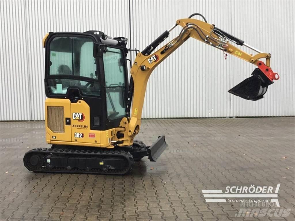 CAT 302 CR Колісні екскаватори