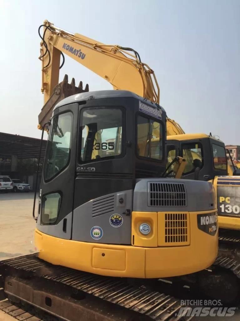 Komatsu pc78us Середні екскаватори 7т. - 12т.