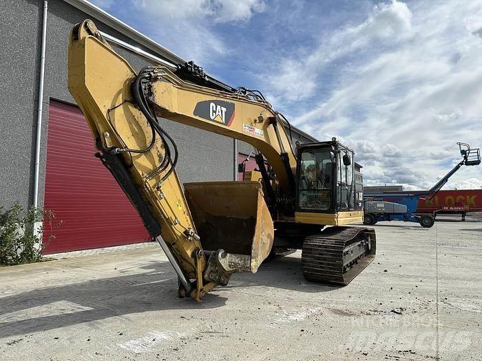 CAT 335FL Гусеничні екскаватори