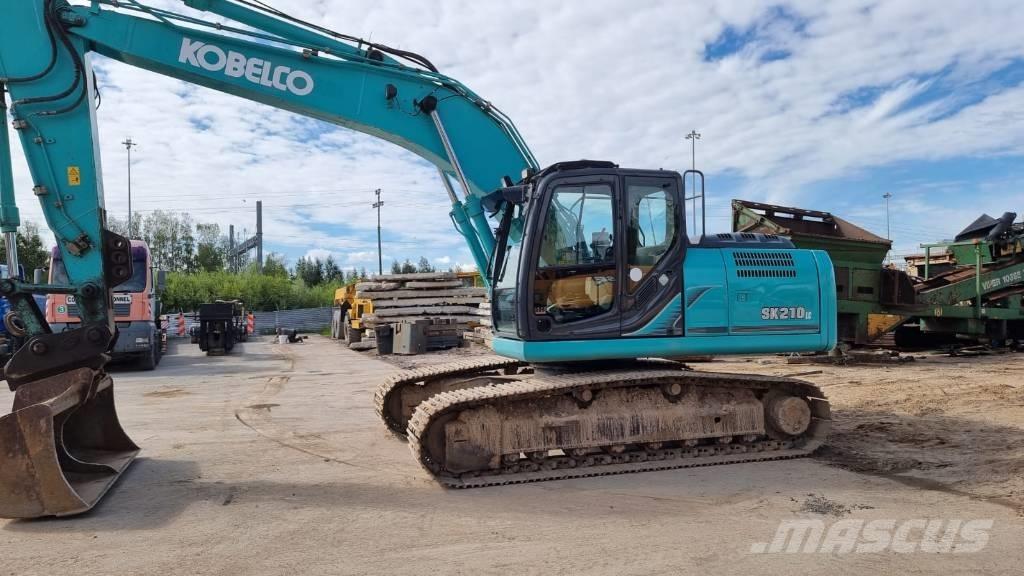 Kobelco SK 210 LC Гусеничні екскаватори