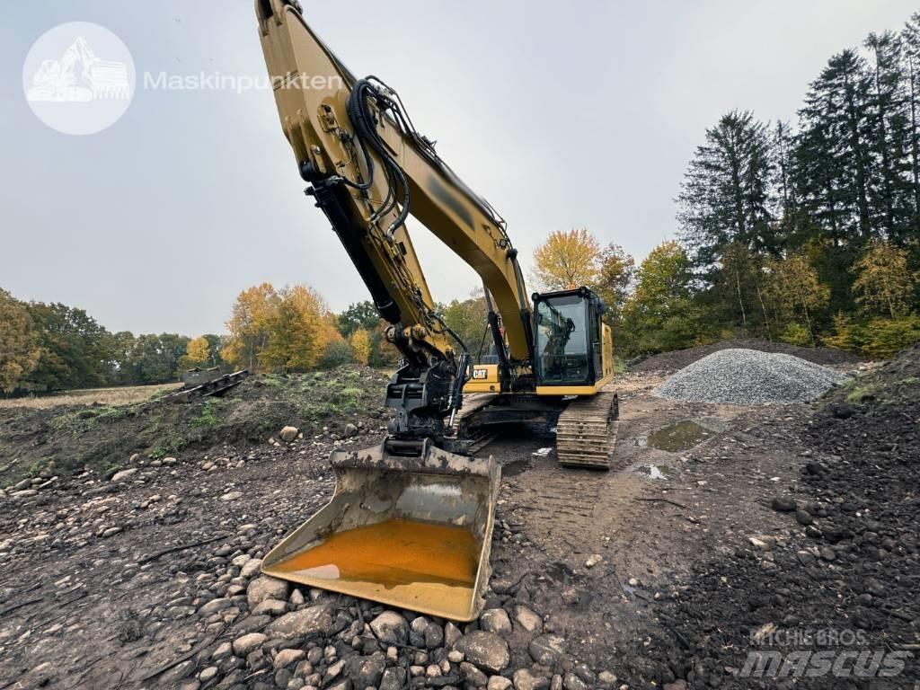 CAT 323 Гусеничні екскаватори