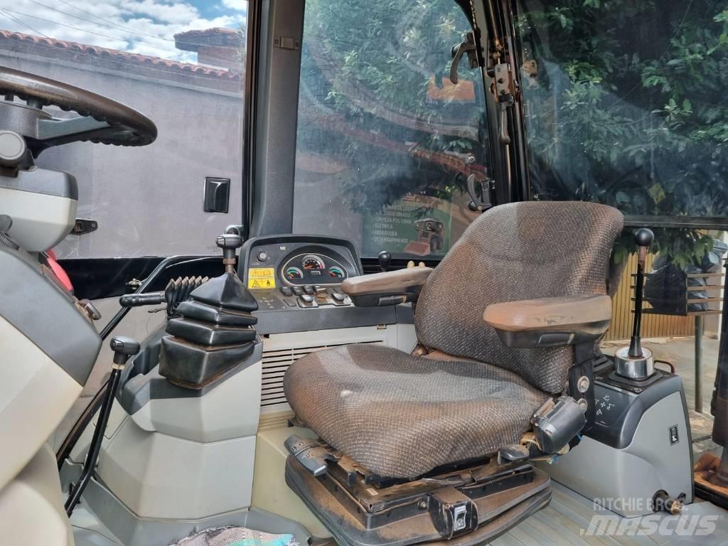 CAT 416E Екскаватори-навантажувачі