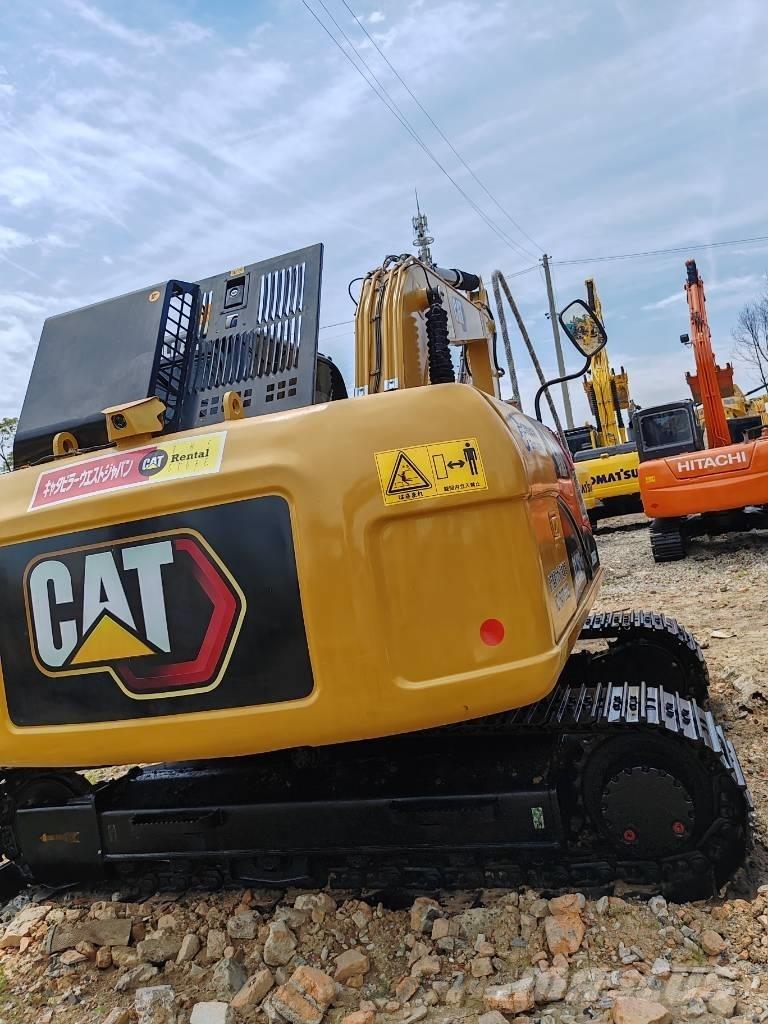 CAT 312 Гусеничні екскаватори