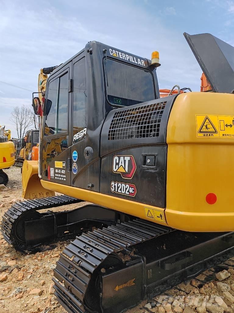 CAT 312 Гусеничні екскаватори