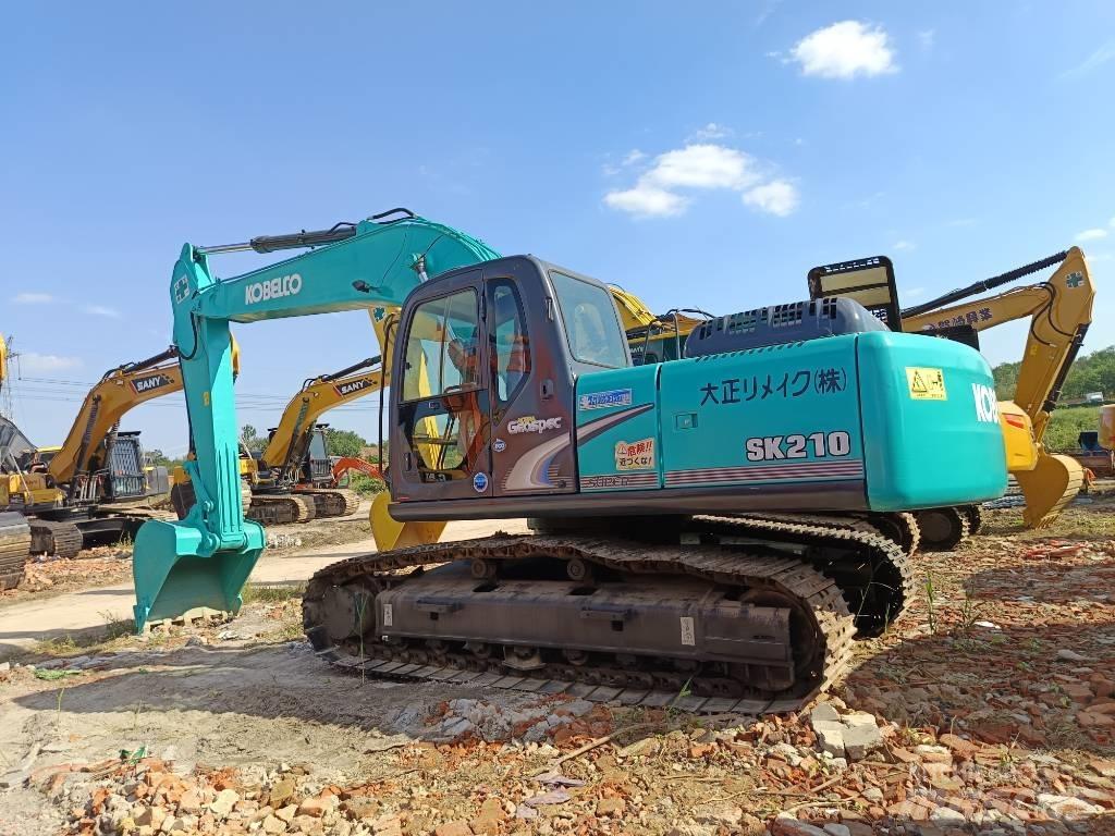Kobelco SK210 Гусеничні екскаватори