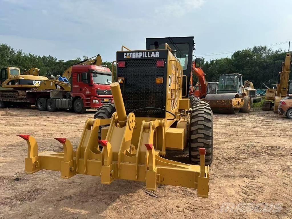 CAT 140K Грейдери