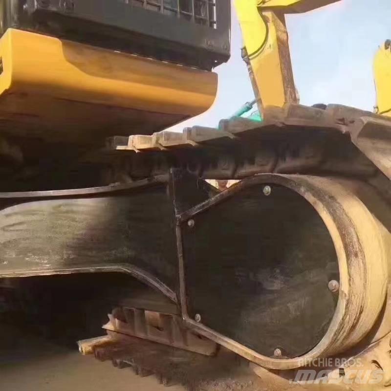 CAT 340 Гусеничні екскаватори