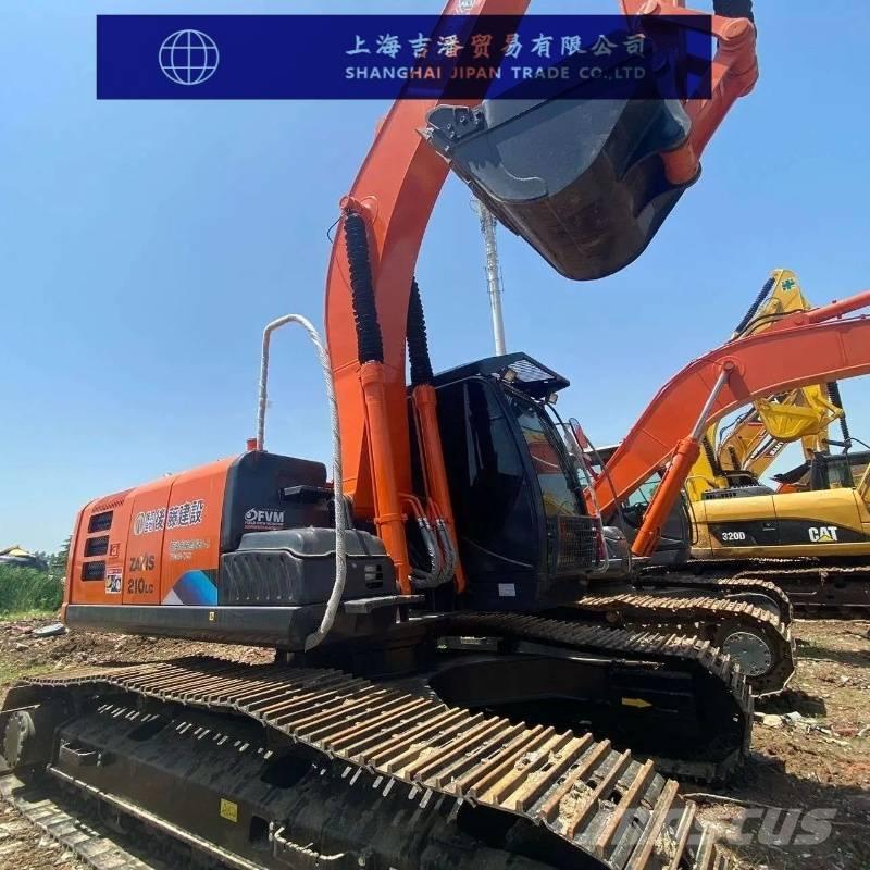 Hitachi ZX 210 Гусеничні екскаватори