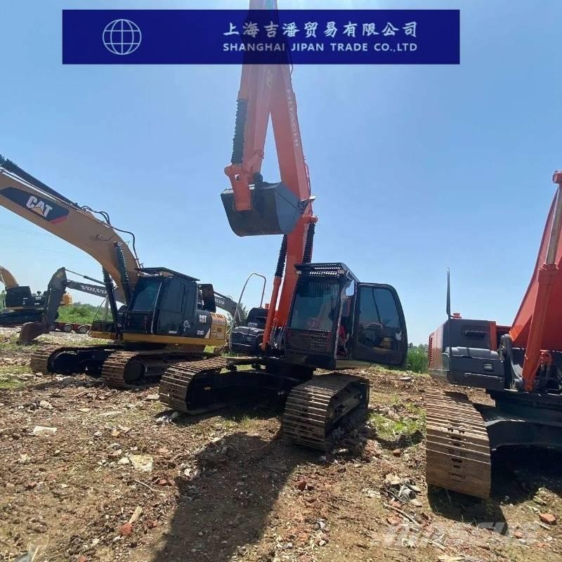 Hitachi ZX 210 Гусеничні екскаватори