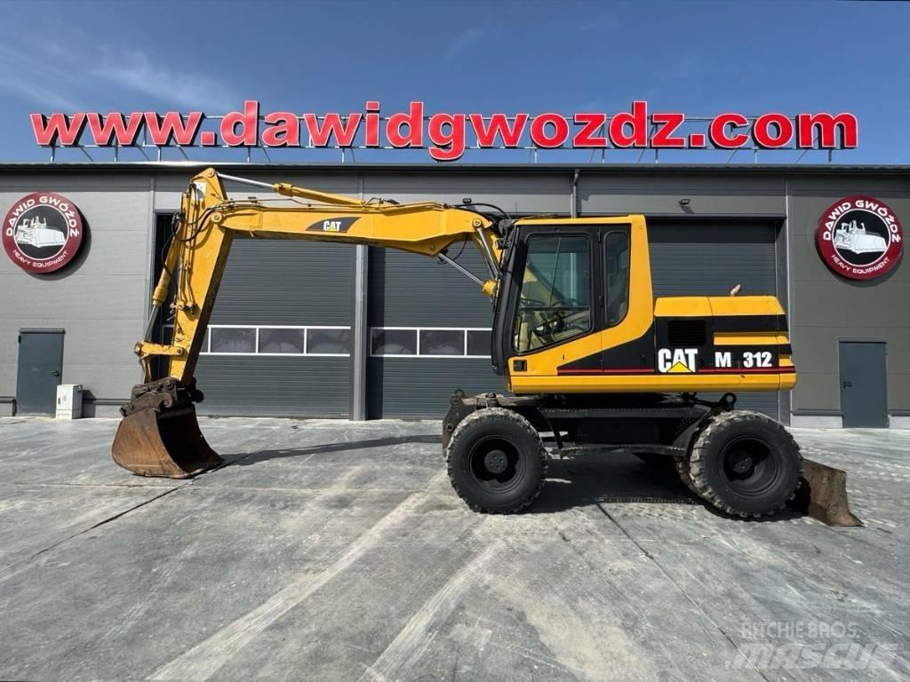 CAT M 312 Колісні екскаватори