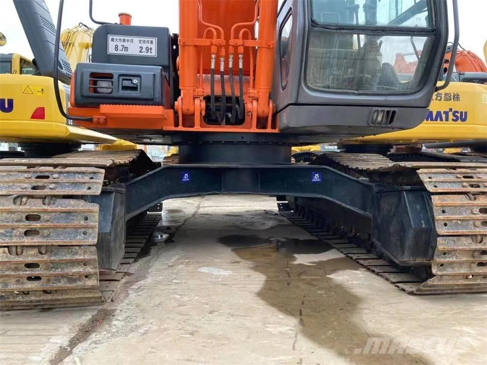 Hitachi EX 1200 Гусеничні екскаватори