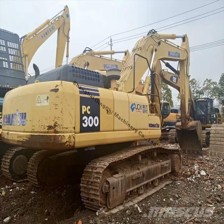 Komatsu 300 Гусеничні екскаватори