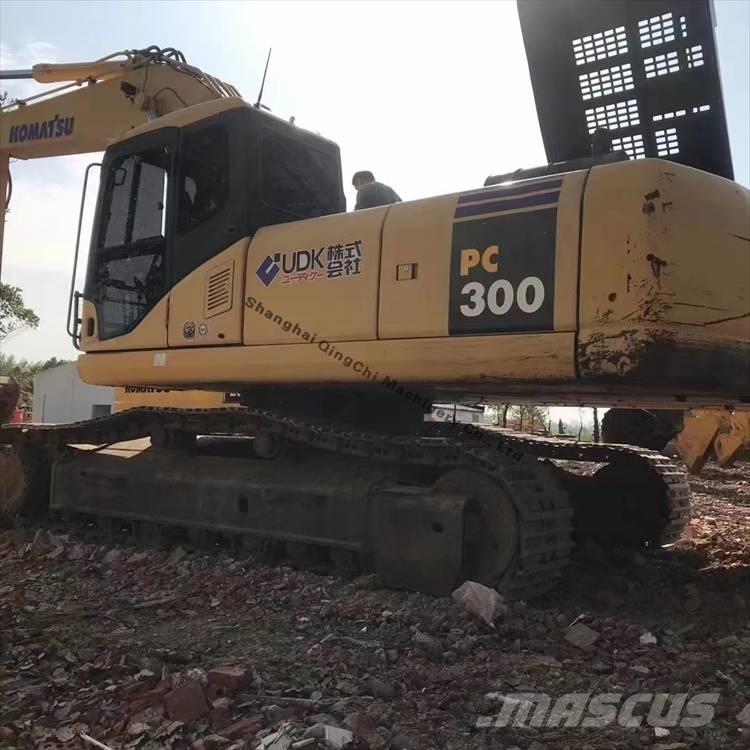 Komatsu 300 Гусеничні екскаватори