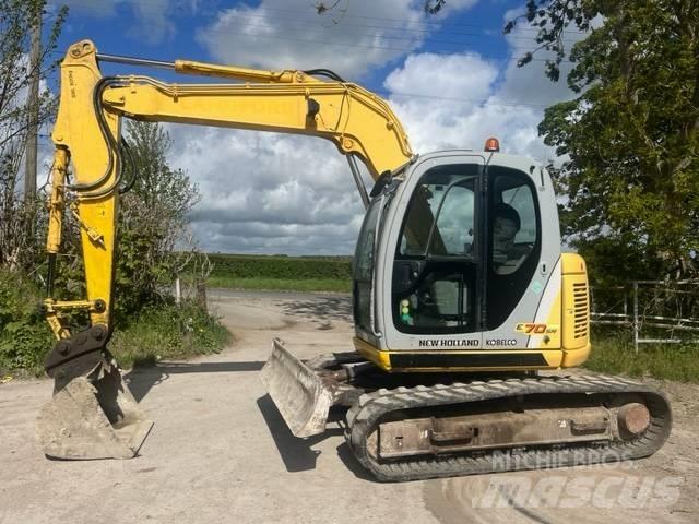 New Holland E 70 SR Середні екскаватори 7т. - 12т.