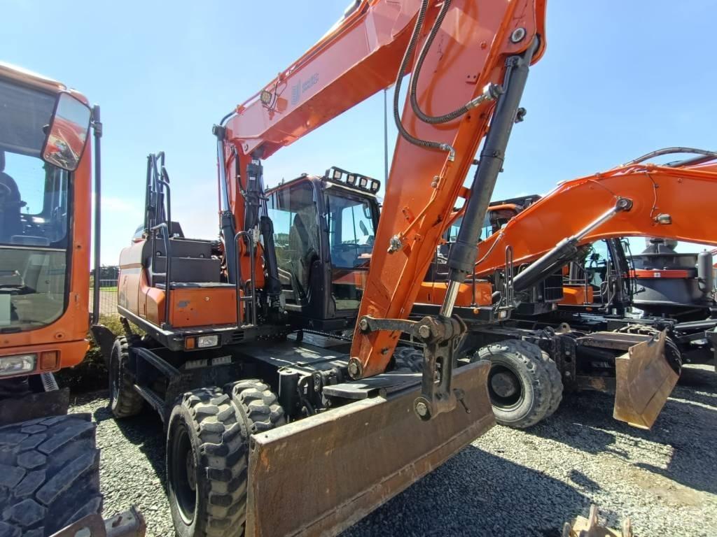 Doosan DX140W-5 Колісні екскаватори