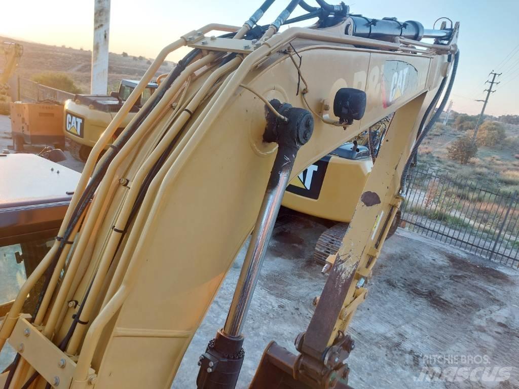 CAT 312 E Гусеничні екскаватори