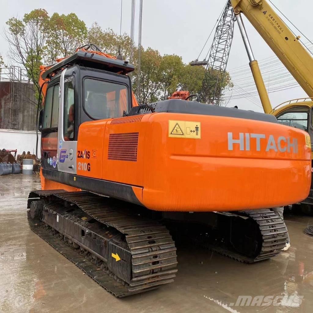 Hitachi ZX 210 Гусеничні екскаватори