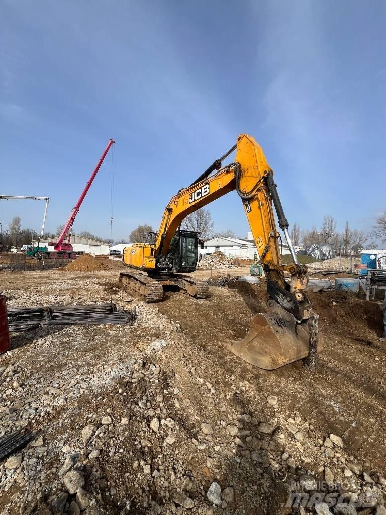 JCB JS 210 Гусеничні екскаватори
