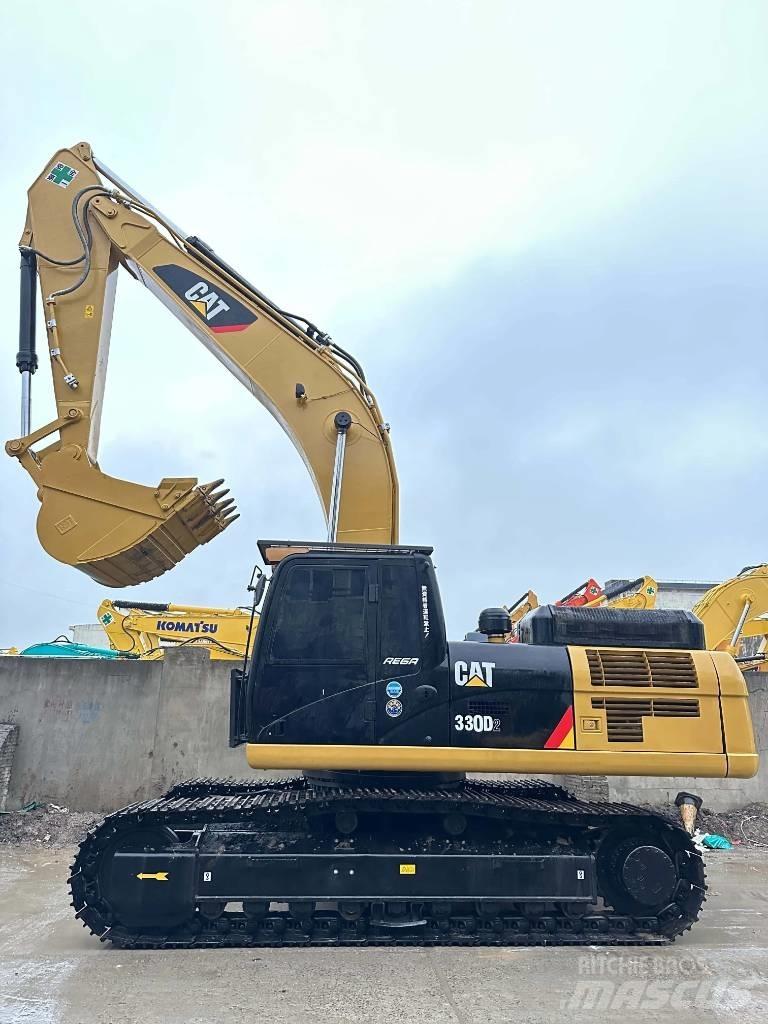 CAT 330 D2 Середні екскаватори 7т. - 12т.