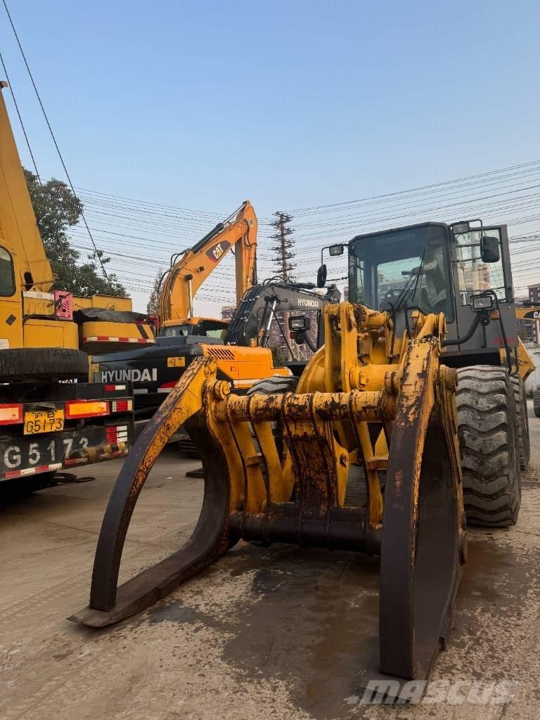 TCM L 27 Фронтальні навантажувачі