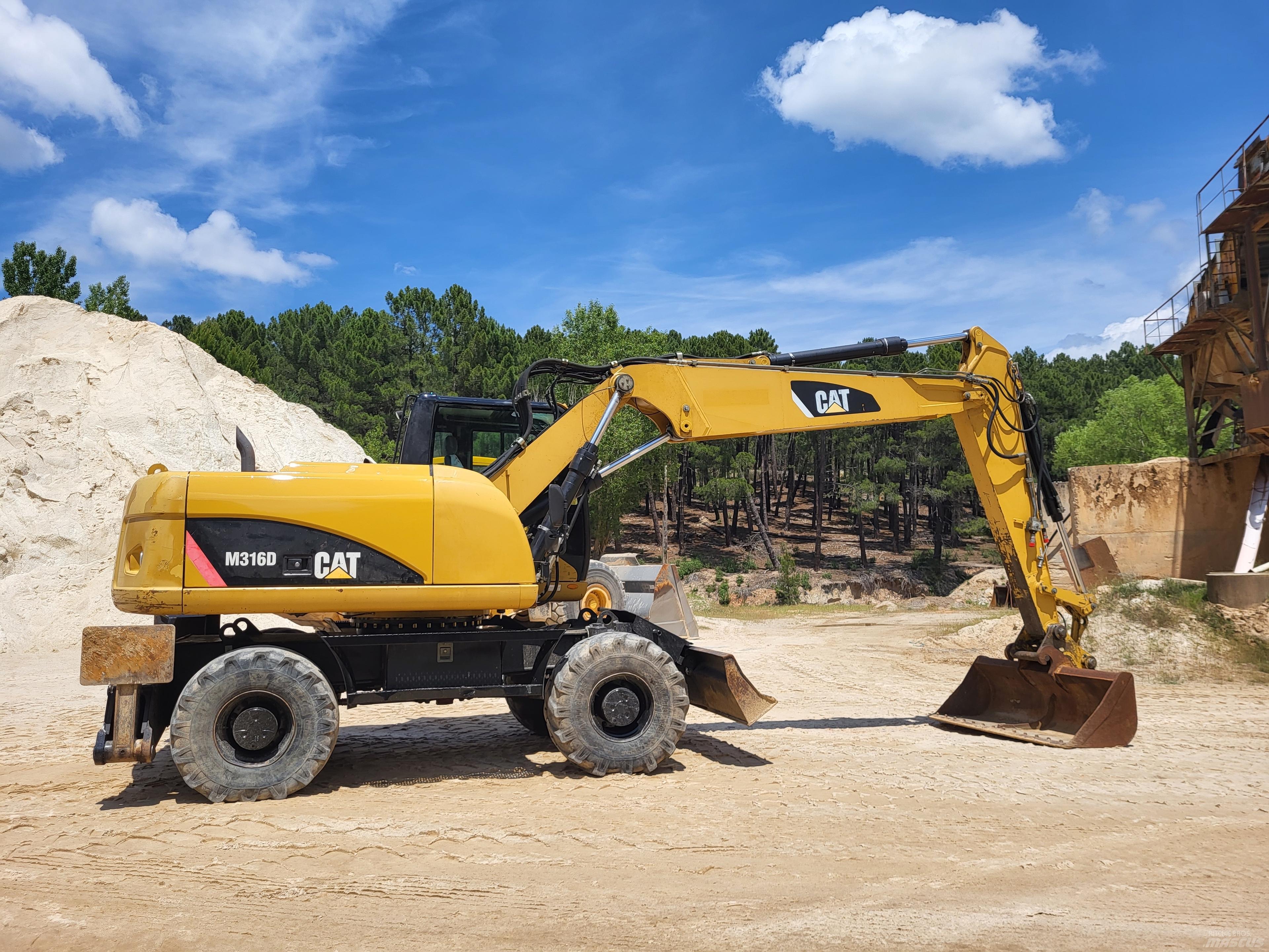 CAT 316d Колісні екскаватори