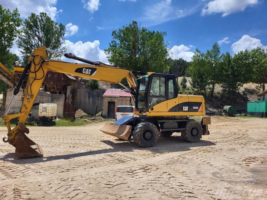 CAT 316d Колісні екскаватори