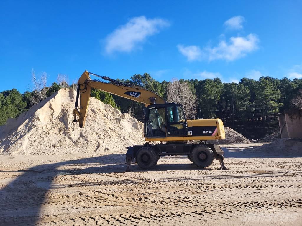 CAT 316d Колісні екскаватори