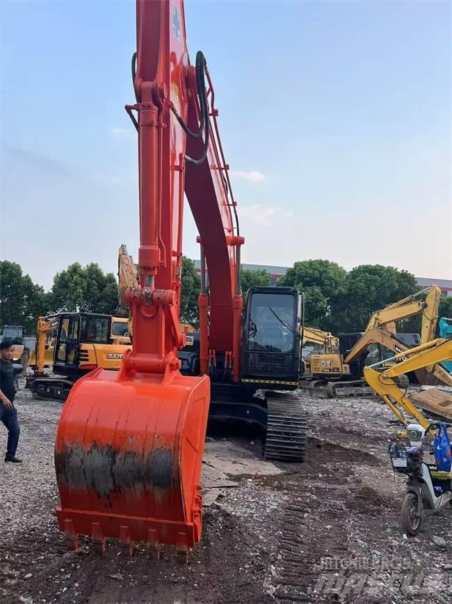 Hitachi ZX 200 Гусеничні екскаватори