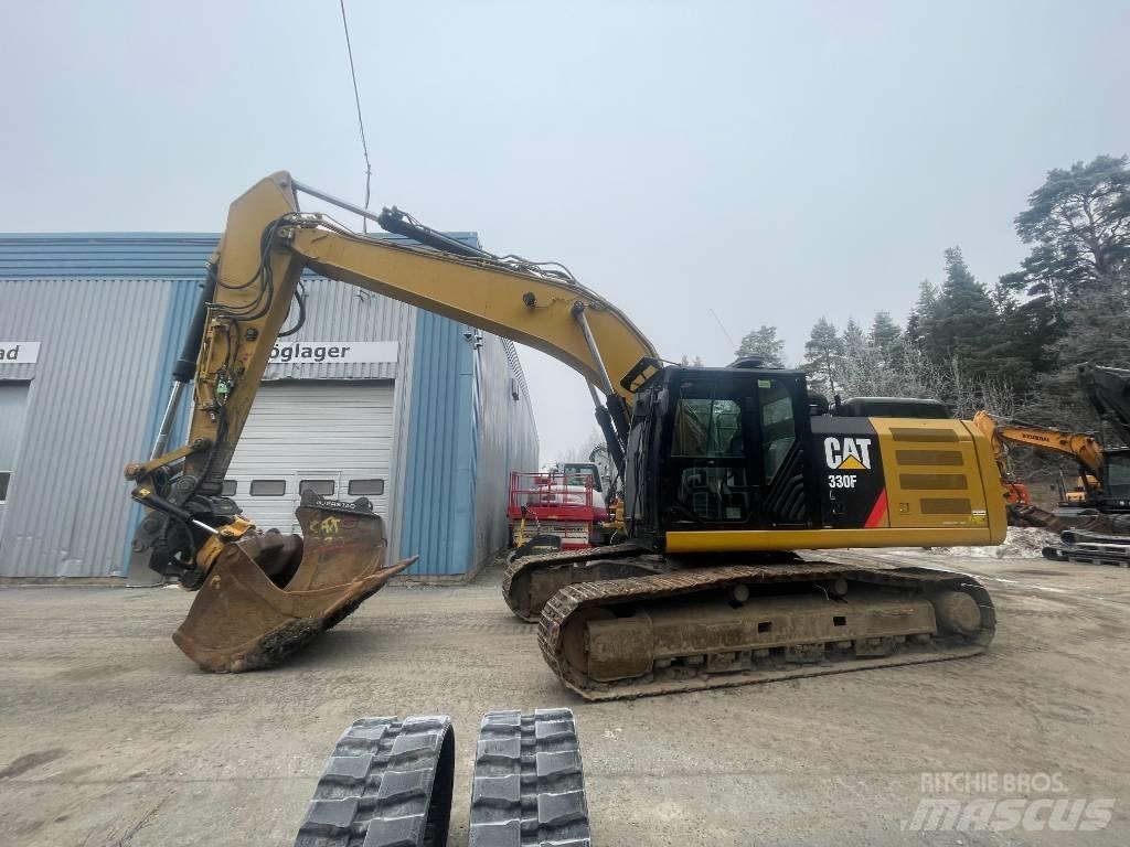 CAT 330 Гусеничні екскаватори