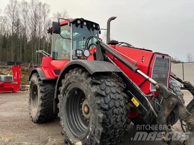 Huddig 1260 Екскаватори-навантажувачі