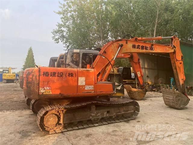 Hitachi ZX70 Гусеничні екскаватори