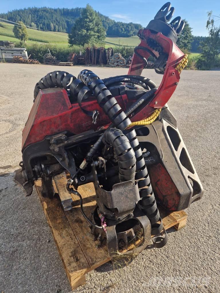 Komatsu 124 Сучкорізи