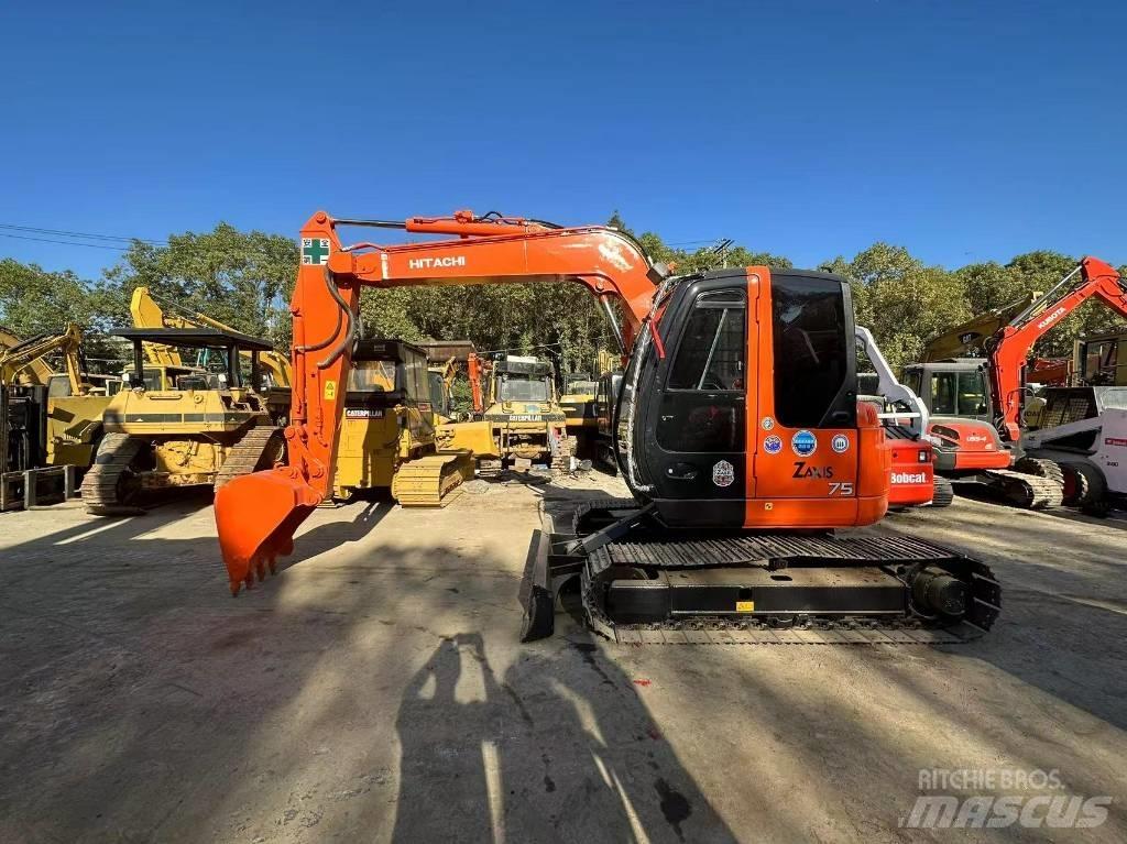 Hitachi ZX 75 Міні-екскаватори < 7т