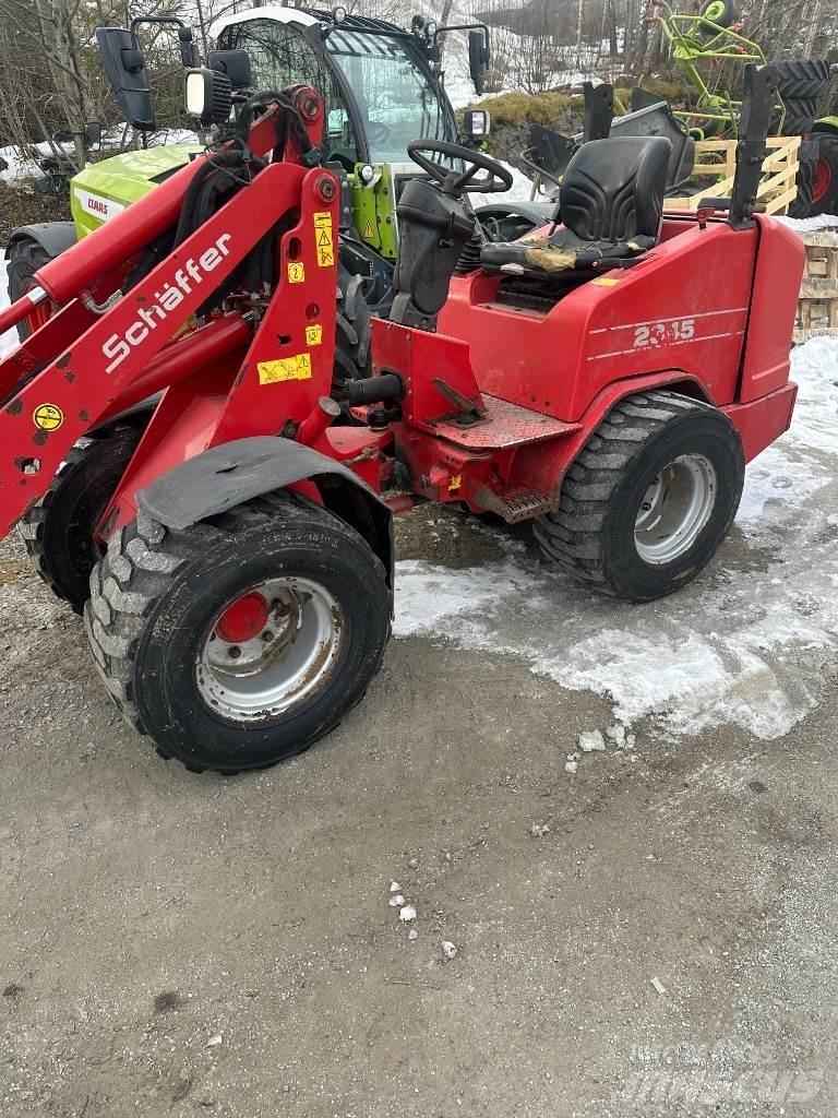 SCHAEFER 2345 Багатофункціональне обладнання для вантажних і землекопальних робіт
