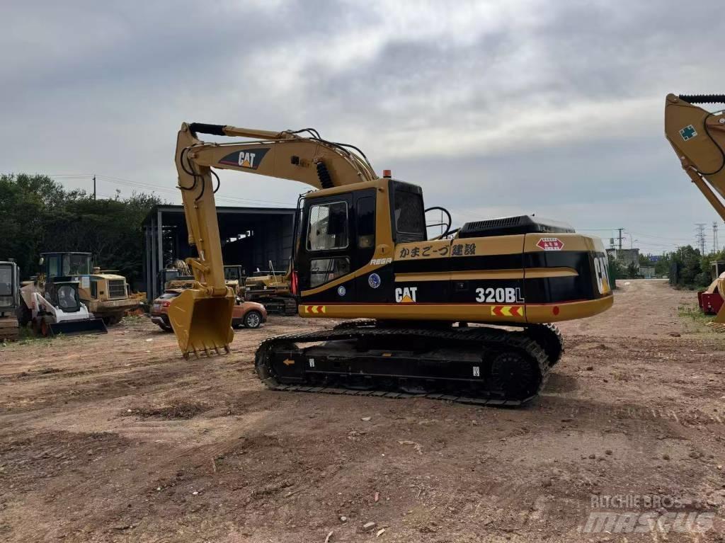 CAT 320 B L Гусеничні екскаватори