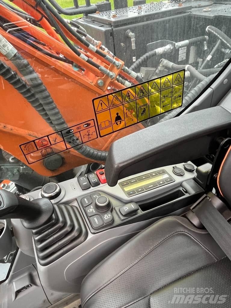 Develon DX140W-7 Колісні екскаватори