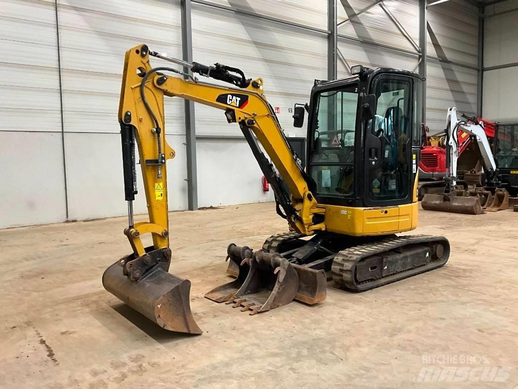 CAT 303 E Гусеничні екскаватори
