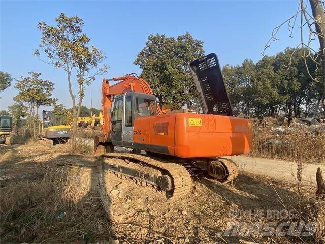 Hitachi ZX 240 Гусеничні екскаватори