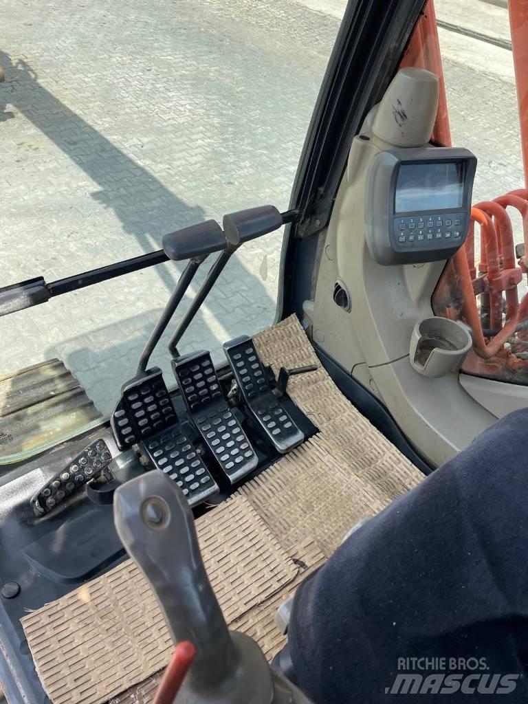 Hitachi ZX 180 Гусеничні екскаватори