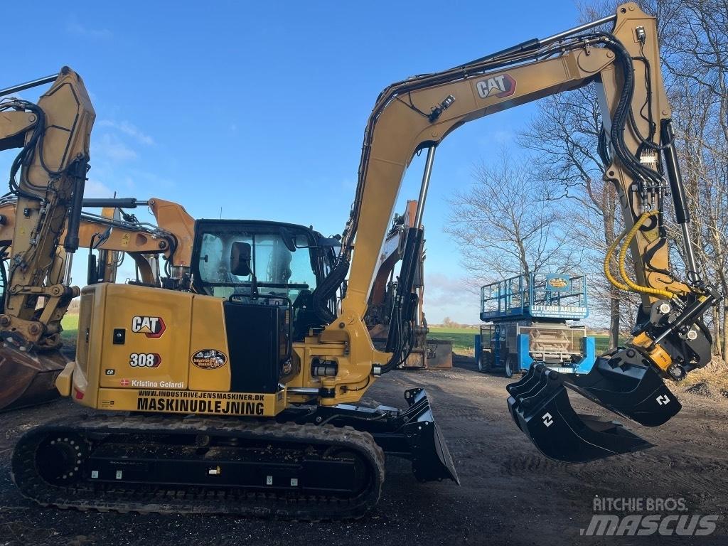 CAT 308 Середні екскаватори 7т. - 12т.