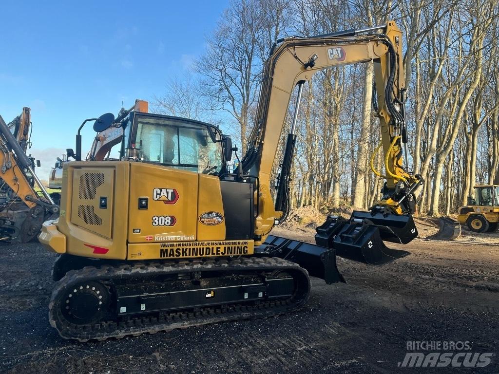 CAT 308 Середні екскаватори 7т. - 12т.