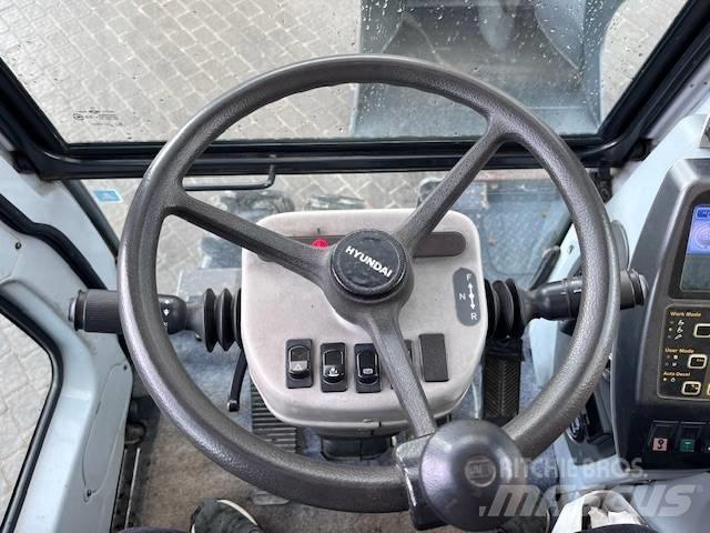 Hyundai Robex 140 W Колісні екскаватори