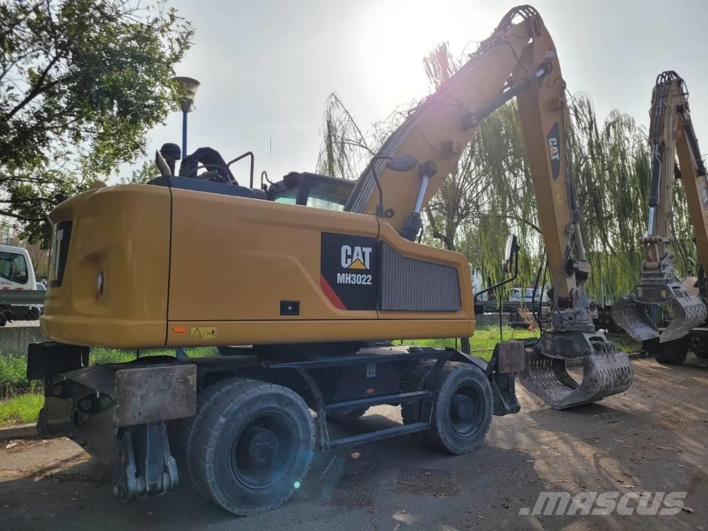 CAT mh3022 Колісні екскаватори