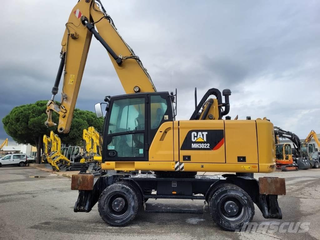 CAT mh3022 Колісні екскаватори